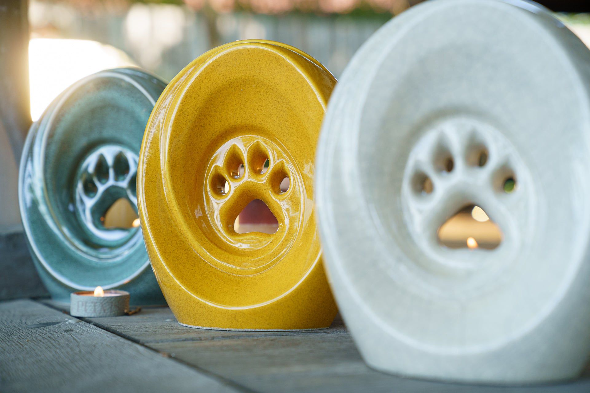 Paw Pet Urn for Ashes in Amber Yellow