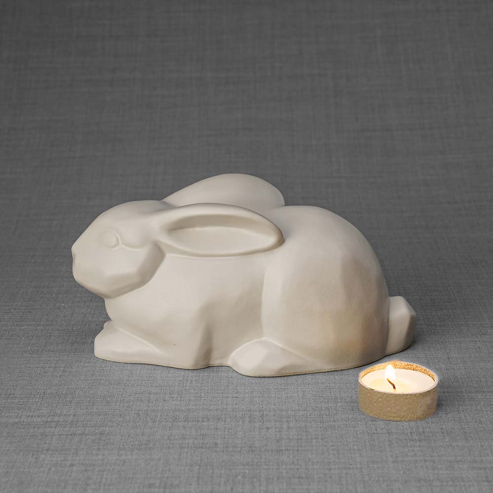 Rabbit Urn For Ashes Matte White Left With Candle