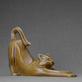Stretching Cat Urn for Ashes in Dark Sand