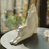 Stretching Cat Urn For Ashes Matte White On Table Front Left