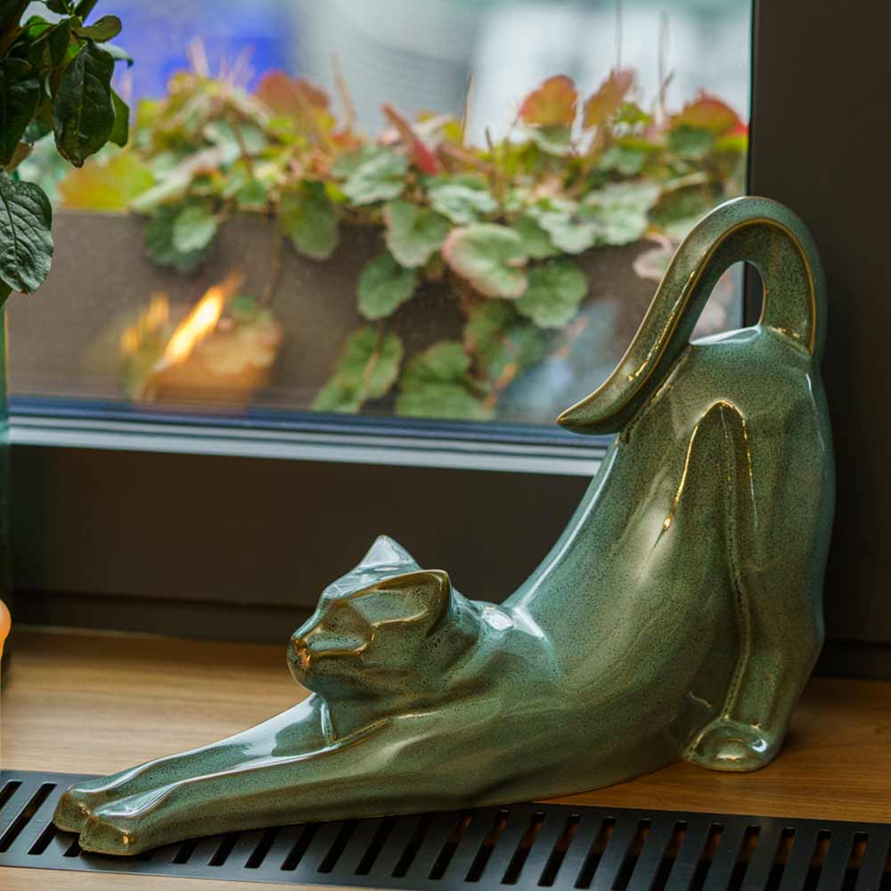 Stretching Cat Urn For Ashes Oily Green On Window Ledge Left Side