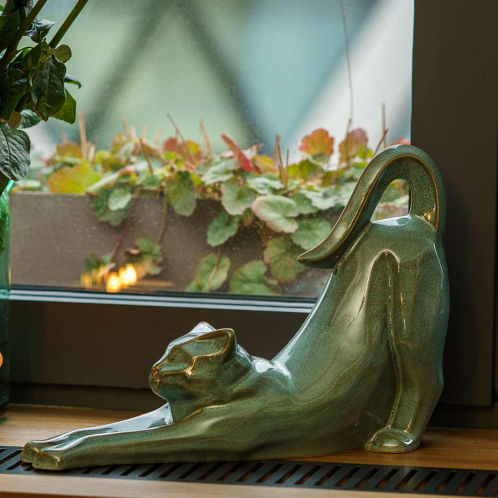 Stretching Cat Urn For Ashes Oily Green On Window Ledge Left