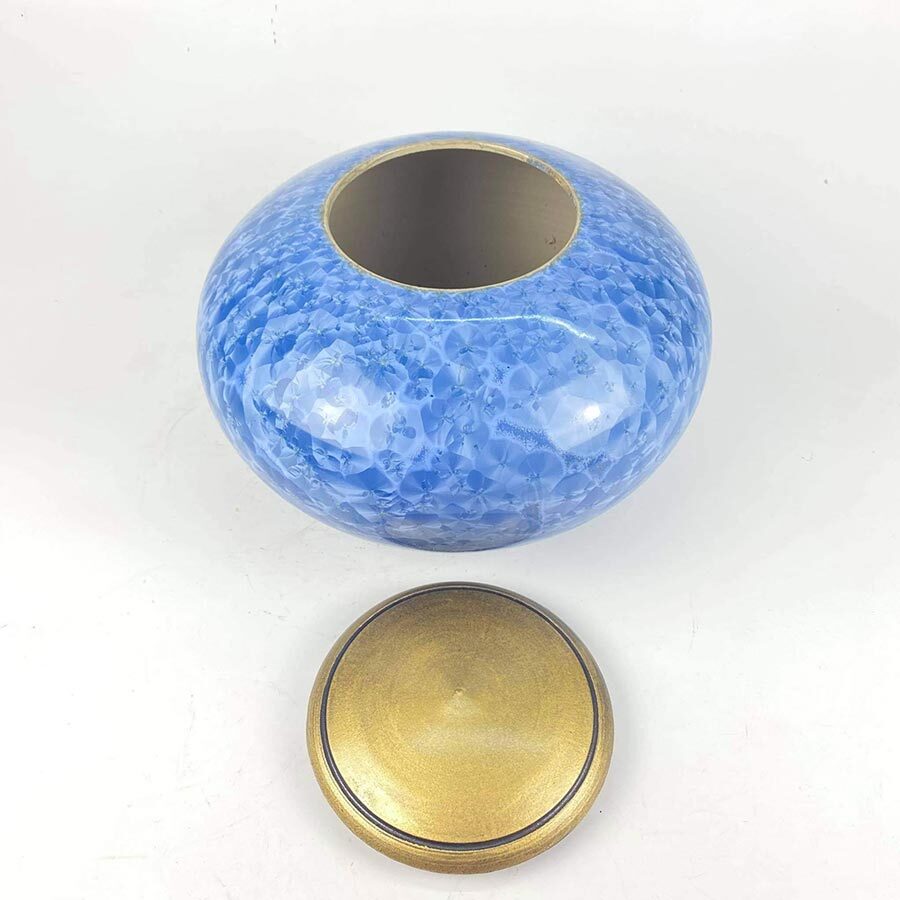 Aether Cremation Urn with lid open in top view