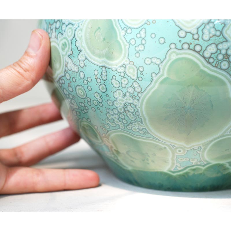 Amazonite Cremation Urn for Ashes Adult Close Up With Hand