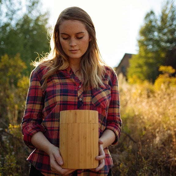 Bamboo Biodegradable Burial Urn for Pets Ashes Girl Holding