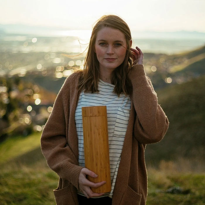 Bamboo Eco Friendly Scattering Tube for Pets Ashes Girl Holding