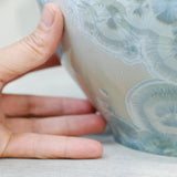 Berly Cremation Urn for Ashes Close Up with Hand