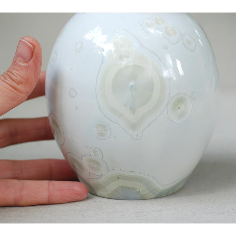 Dolomite Cremation Urn for Pets Ashes Close up with Hand