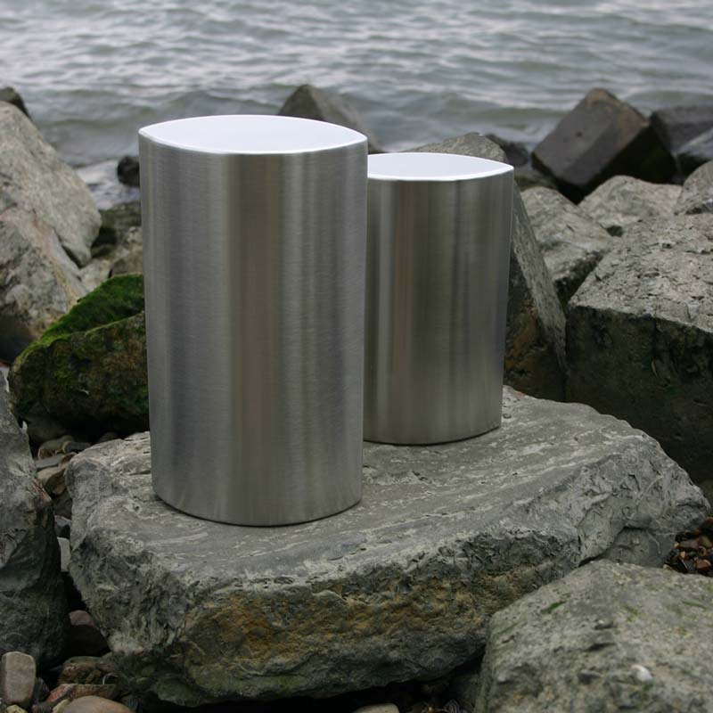 Ellipse Cremation Urn for Ashes Adult in Stainless Steel on Rocks
