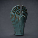 Guardian Cremation Urn for Ashes in Oily Green Turned Right Grey Background