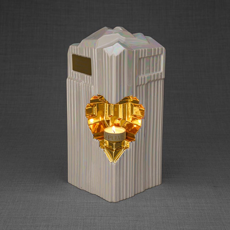 Heart Cremation Urn for Ashes Pearlescent White and Gold Front View Candle Light