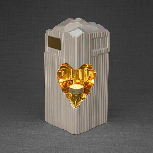 Heart Cremation Urn for Ashes Pearlescent White and Gold Front View Candle Light