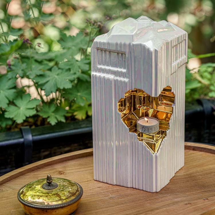 Heart Cremation Urn for Ashes Pearlescent White and Gold Outside Angled View