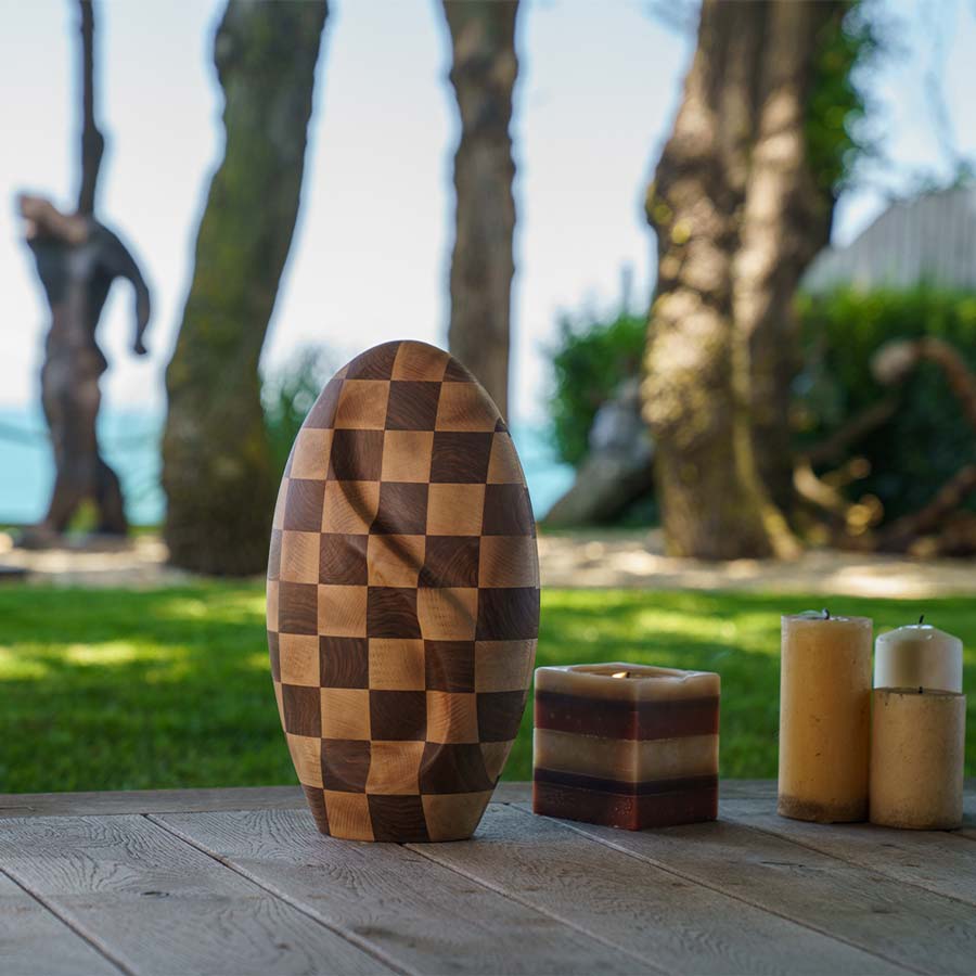 Infinity Wooden Adult Urn for Ashes Chequered Walnut and Beech Wood in Garden