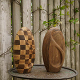 Infinity Wooden Adult Urn for Ashes Chequered and Walnut on Table in Garden