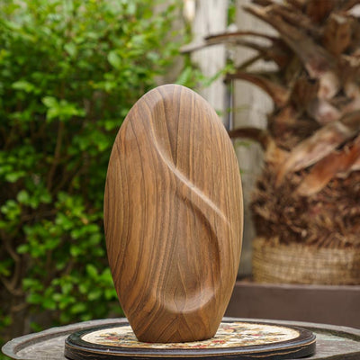 Infinity Wooden Adult Urn for Ashes Walnut Wood on Table in Garden 