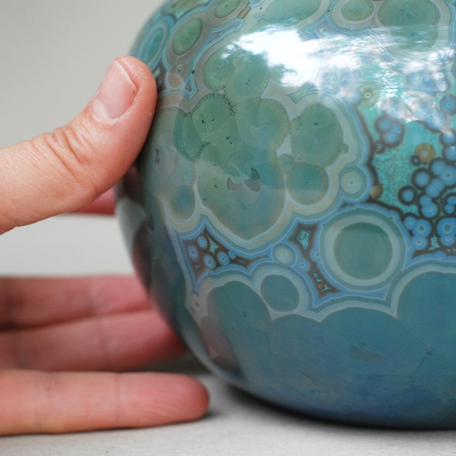 Larimar Cremation Urn for Ashes - Medium Close up with Hand