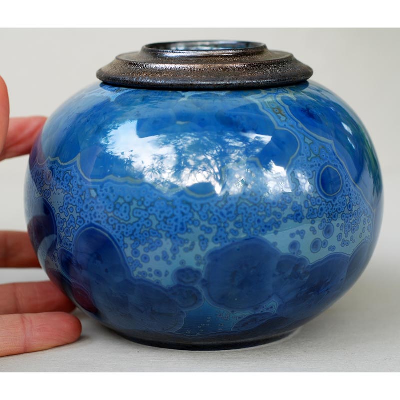 Lazuli Cremation Urn for Pets Ashes Close up with Hand