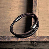 Leather Ashes Bracelet for Men in Brown on Surface Close Up