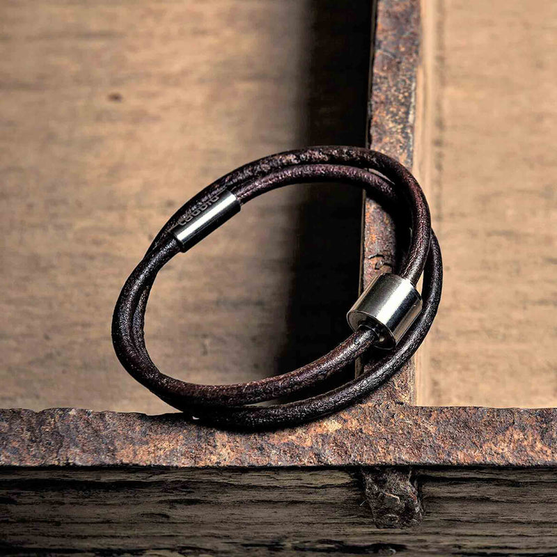 Leather Ashes Bracelet for Men in Brown on Surface Close Up