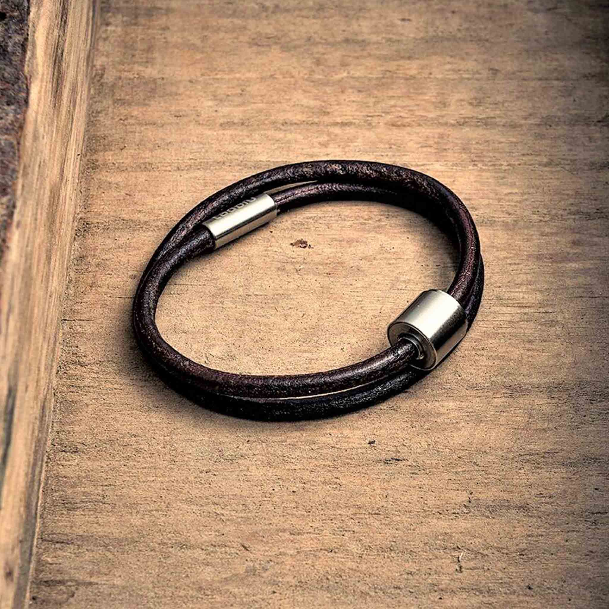 Leather Ashes Bracelet for Men in Brown on Surface