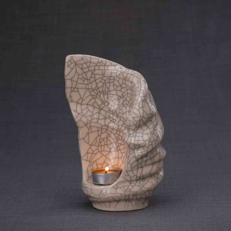 Light Ashes Keepsake Urn in Crackle Glaze Dark Background Facing Left