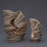 Light Cremation Urn and Ashes Keepsake Urn in Dark Beige Dark Background