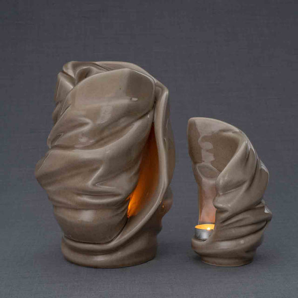 Light Cremation Urn and Ashes Keepsake Urn in Dark Beige Turned Right Dark Background