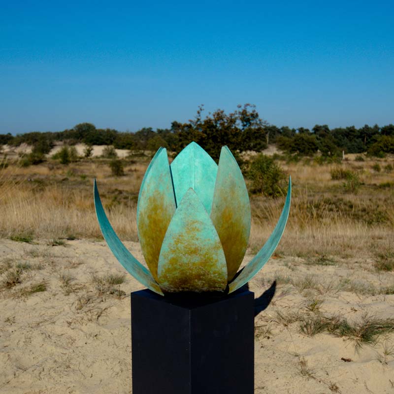 Lotus Ashes Miniature Keepsake Urn in Corten Steel in Sand
