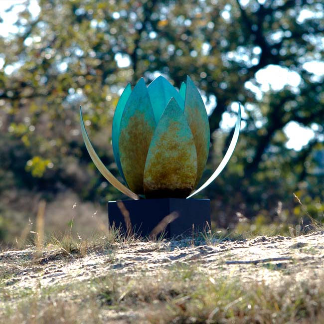 Lotus Ashes Miniature Keepsake Urn in Corten Steel on Hill