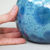 Marine Cremation Urn for Ashes - Medium Close up with Hand
