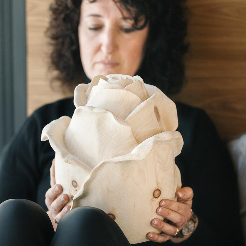 Rose Cremation Urn for Ashes Being Held