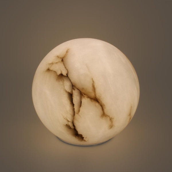Stone Ball Cremation Urn for Ashes Under Light
