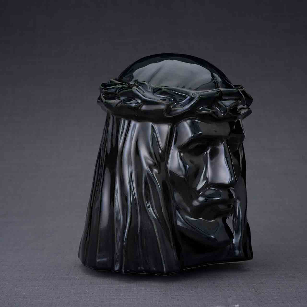 The Christ Cremation Urn for Ashes in Glossy Black Turned Right Dark Background