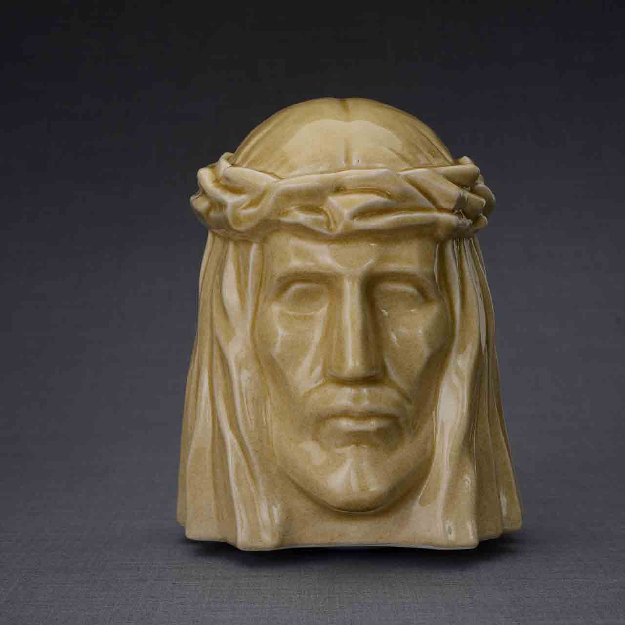 The Christ Cremation Urn for Ashes in Light Sand Dark Background