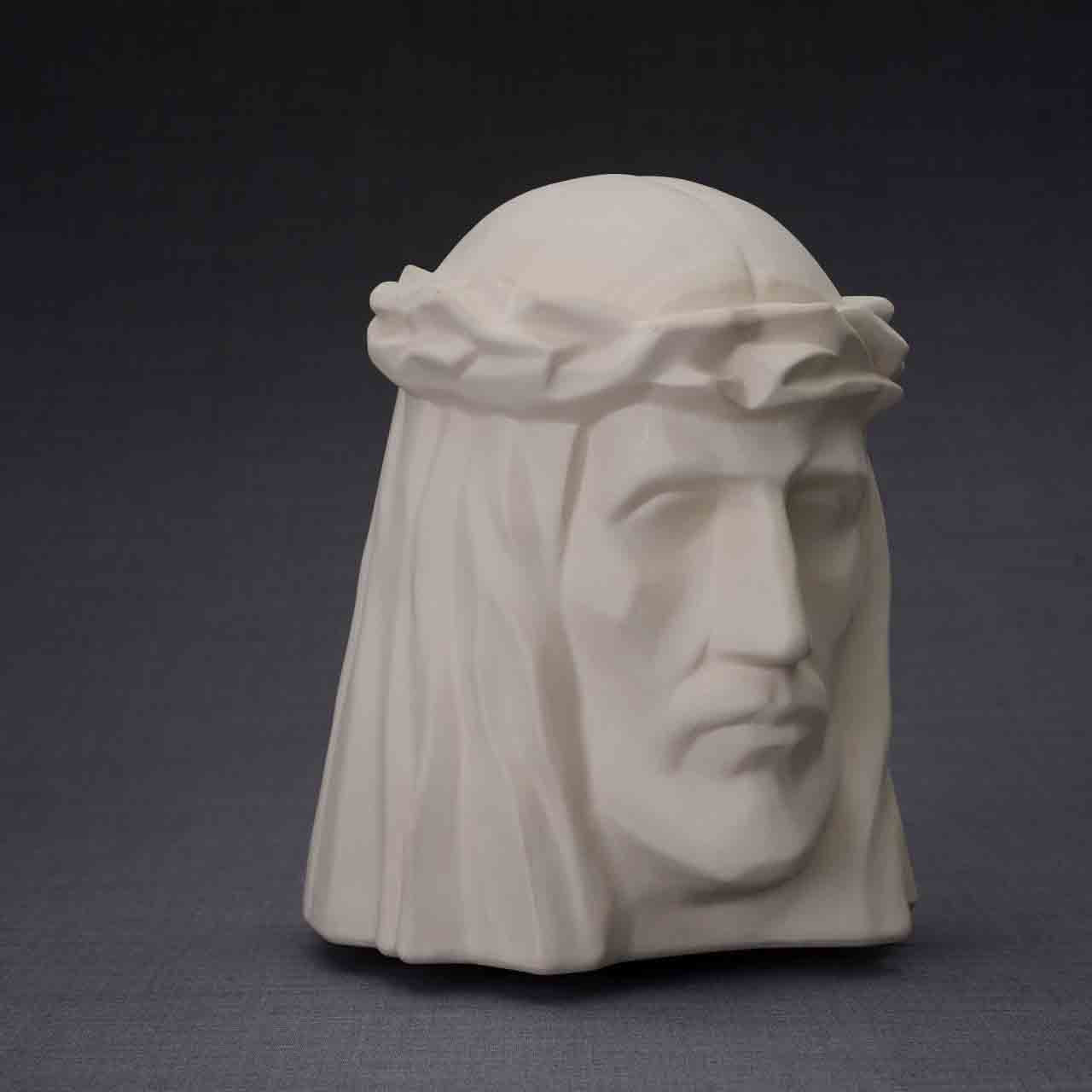 The Christ Cremation Urn for Ashes in Matte White Turned Right Dark Background