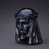 The Christ Cremation Urn for Ashes in Metallic Blue Turned Left Dark Background
