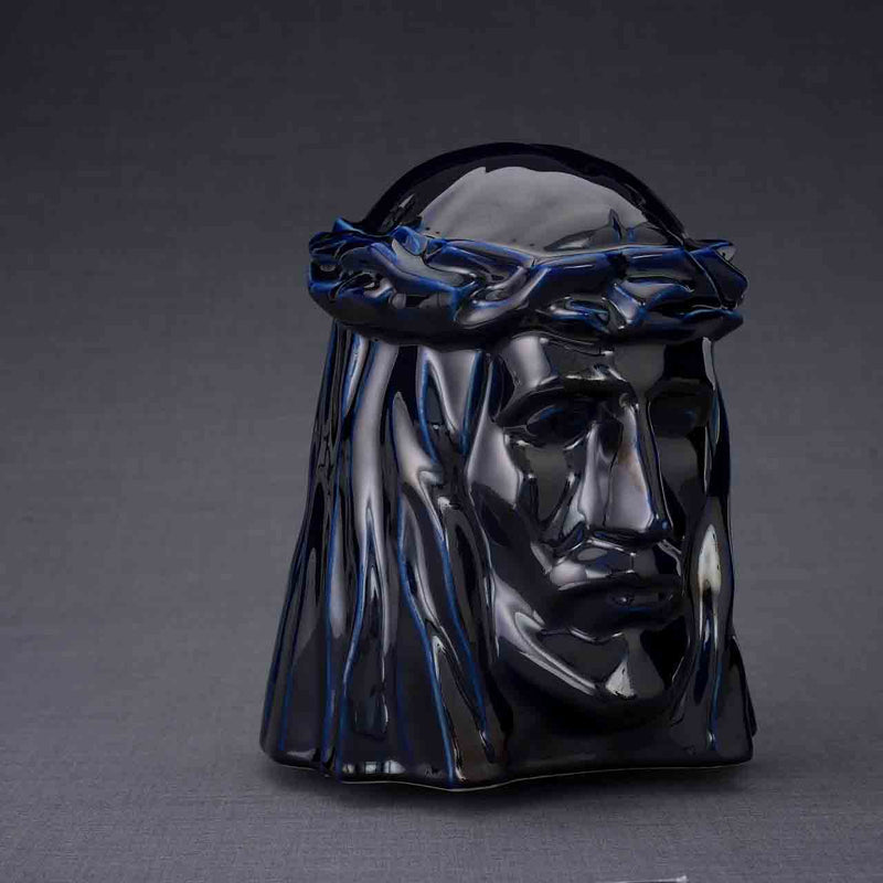The Christ Cremation Urn for Ashes in Metallic Blue Turned Right Dark Background