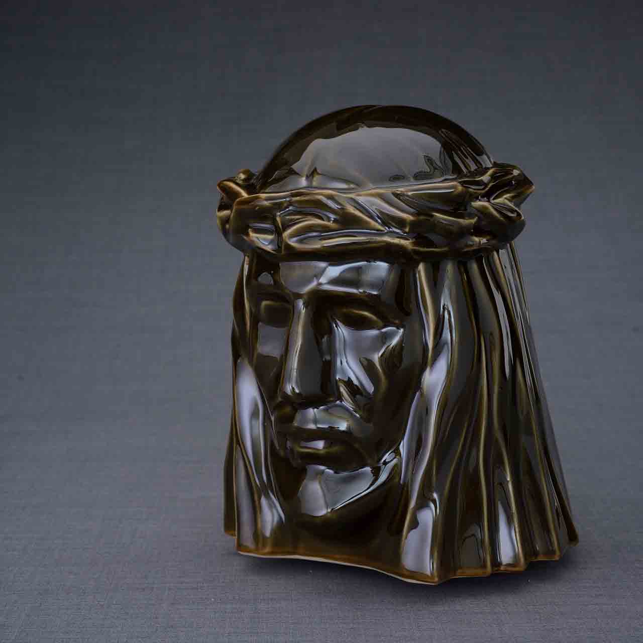 The Christ Cremation Urn for Ashes in Oily Brown Turned Left Dark Background