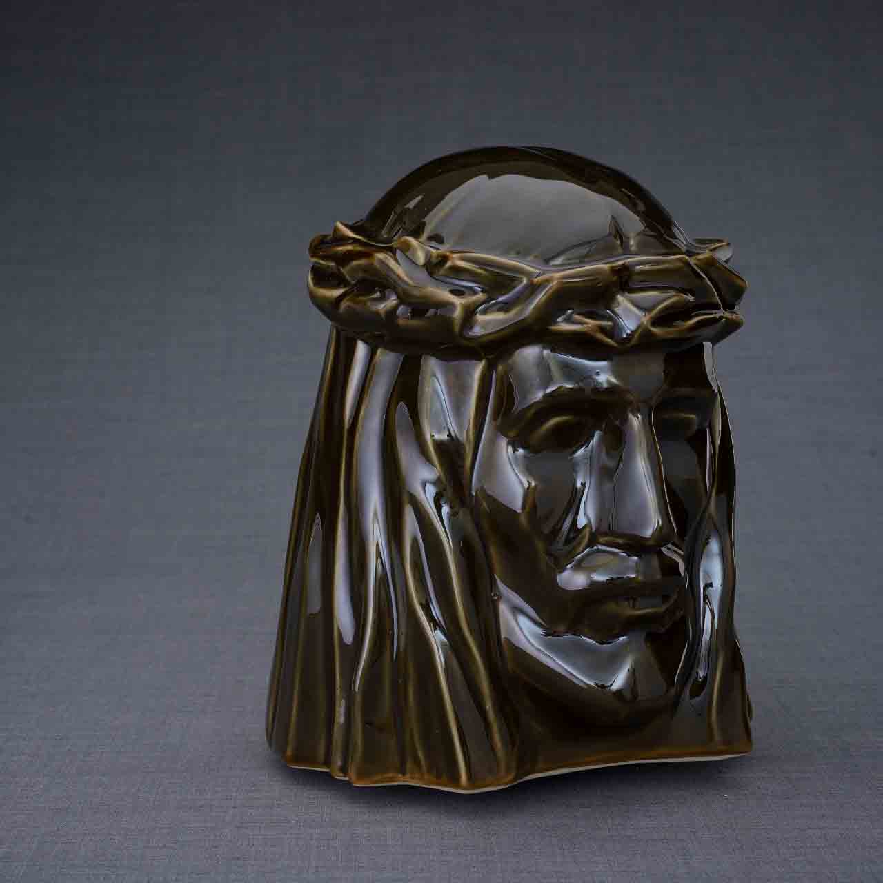 The Christ Cremation Urn for Ashes in Oily Brown Turned Right Dark Background