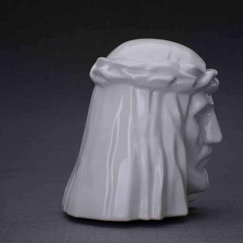 The Christ Cremation Urn for Ashes in White Facing Right Dark Background
