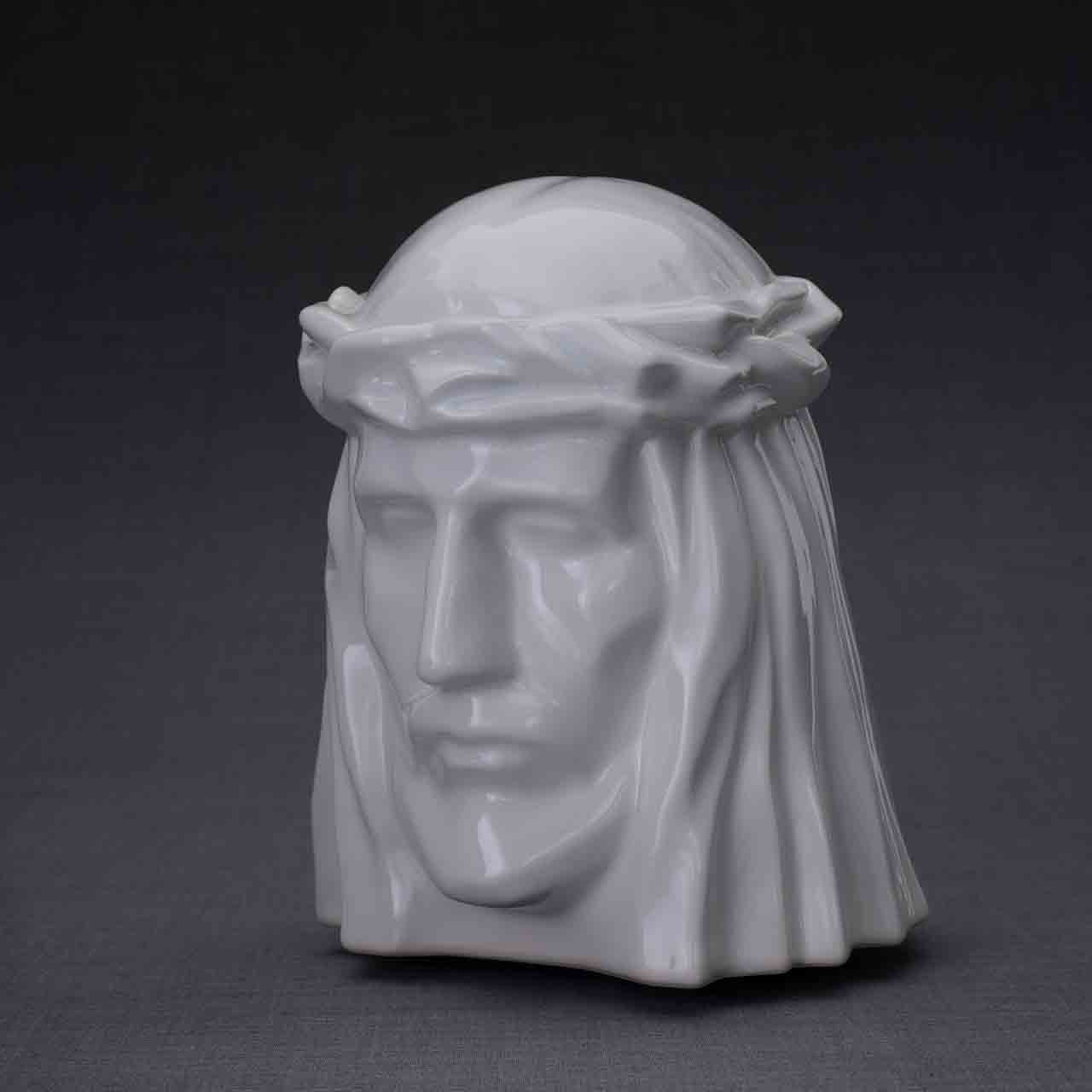 The Christ Cremation Urn for Ashes in White Turned Left Dark Background