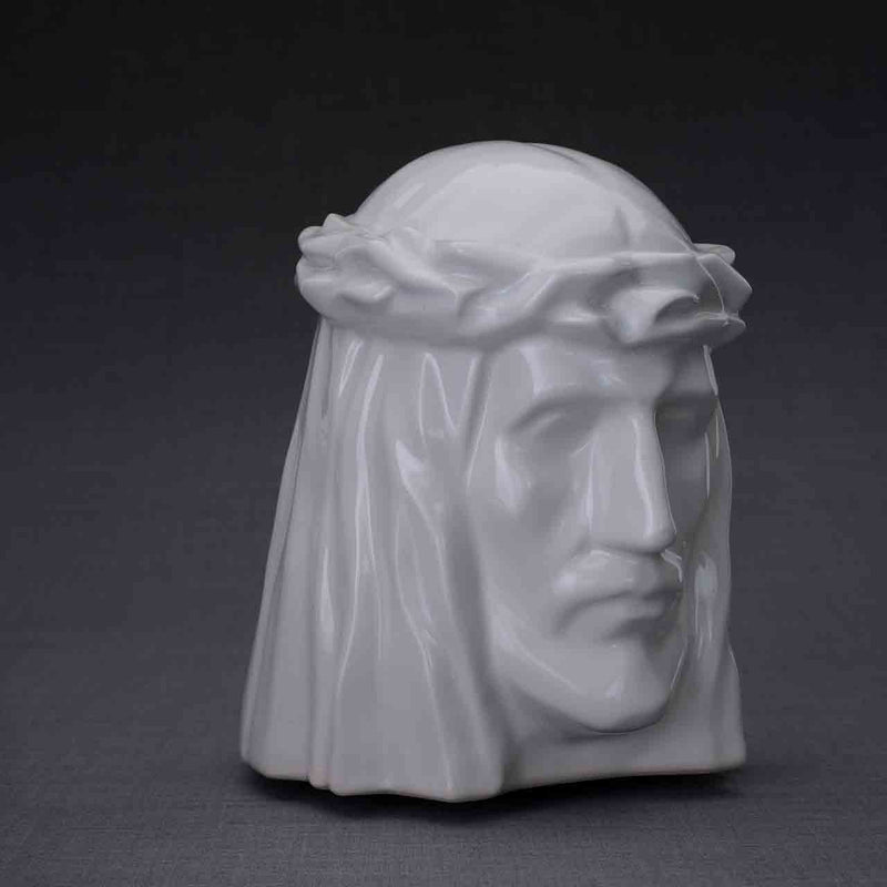 The Christ Cremation Urn for Ashes in White Turned Right Dark Background