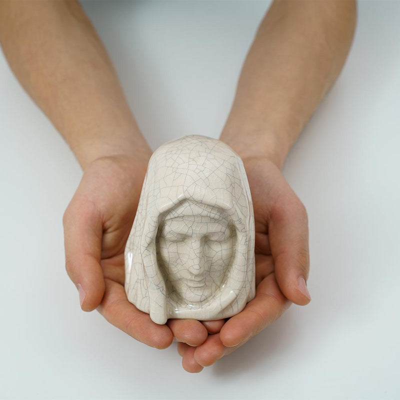 The Holy Mother Ashes Keepsake Urn Crackle Glaze in Hands