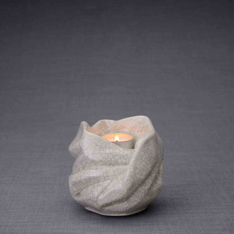 The Holy Mother Ashes Keepsake Urn in Crackle Glaze Dark Baackground