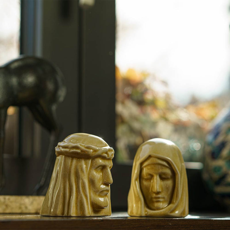The Holy Mother Ashes Keepsake Urn with The Christ Ashes Keepsake Light Sand by Window