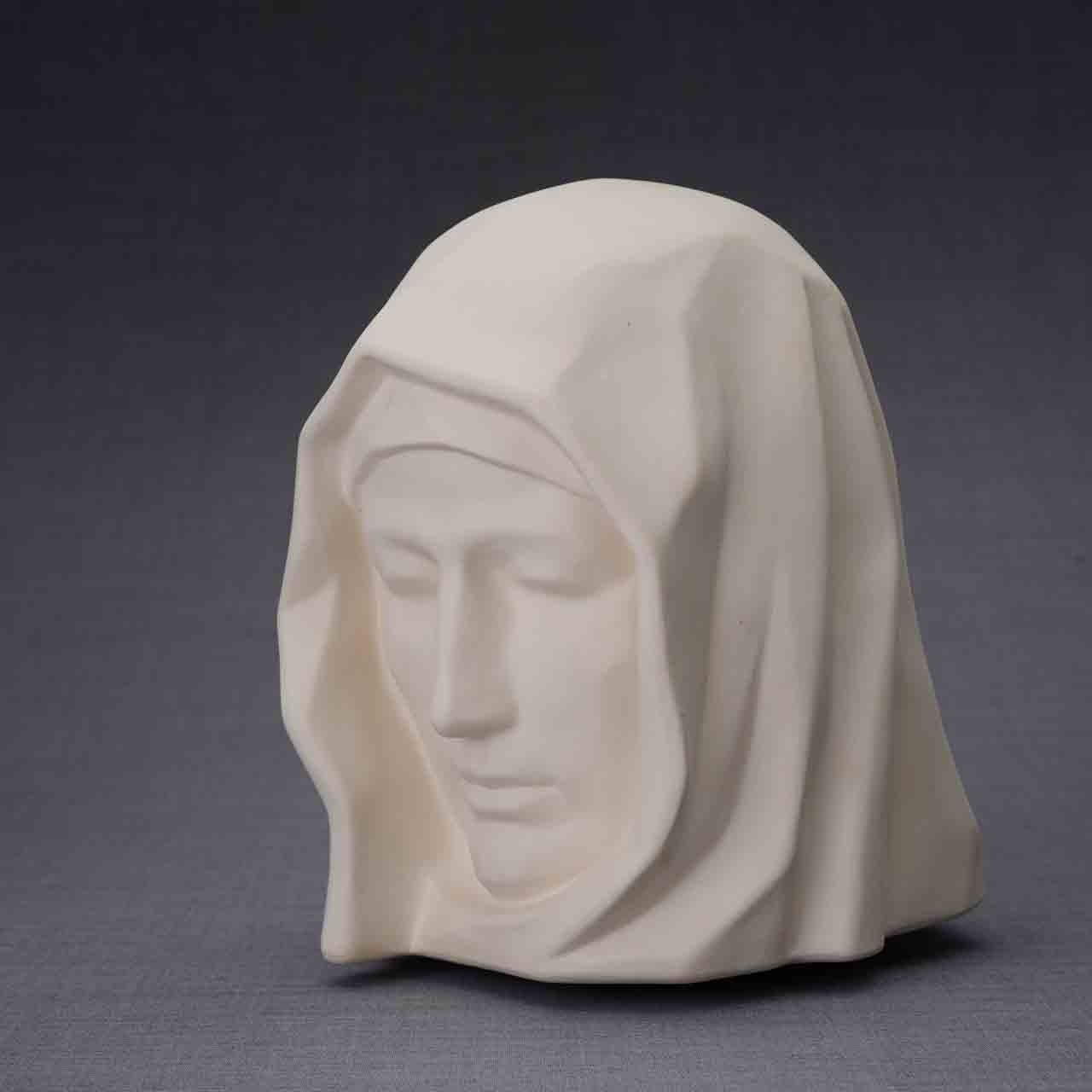 The Holy Mother Cremation Urn for Ashes in Matte White Turned Left Dark Background
