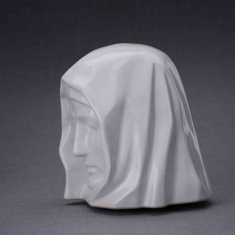 The Holy Mother Cremation Urn for Ashes in White Facing Left Dark Background