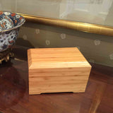 Tribute Solid Bamboo Semi Permanent Biodegradable Urn for Ashes Next to Bowl