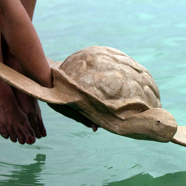 Turtle Biodegradable Water Urn for Ashes being Placed in Water
